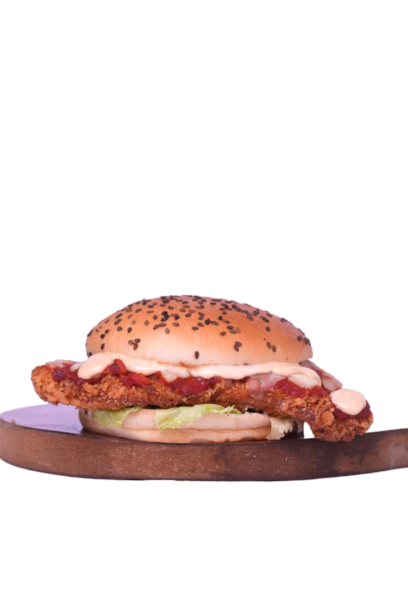 Wonder burger with a crispy fried chicken fillet, tomato jam and creamy mayo